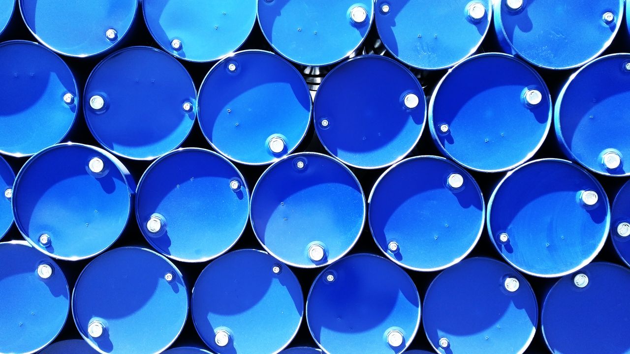 gallery-1 Top view of stacked blue industrial drums forming a geometric pattern.